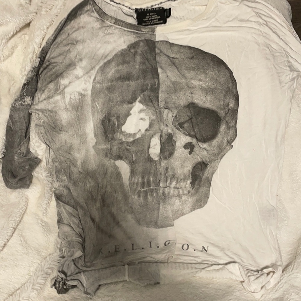 Religion tee size XS